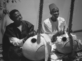 Bai and Dembo Konte playing kora, photo by Marc Pevar